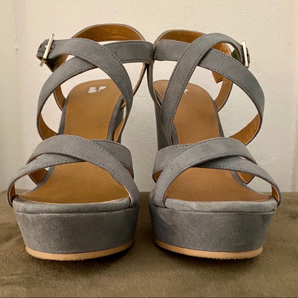 Grey wedge styled high heels
